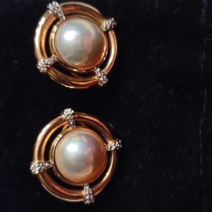 Mabe pearl earrings set in 14kt yellow gold with diamond accents, Button Style